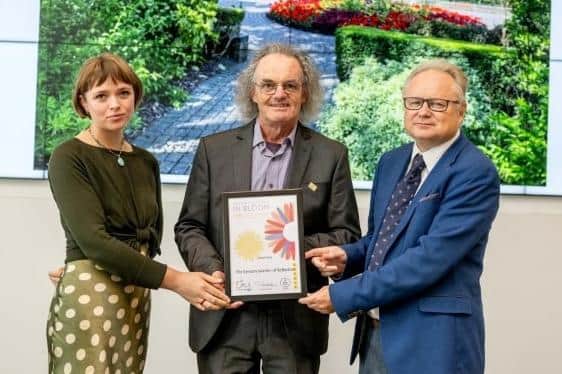 The award for the Fareham Sensory Garden is collected
