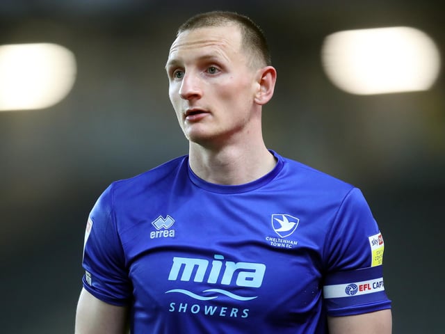 Club: Cheltenham; Age: 26; 2021-22 league appearances: 26; Goals: 4; Clean sheets: 5; Previous clubs: Kilmarnock, York, Macclesfield, Huddersfield