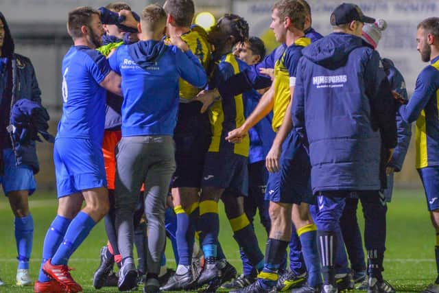 A melee breaks out after the final whistle. Picture by Martyn White