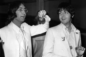 John Lennon and Paul McCartney after a trip to America to promote their new company Apple Corps,  May 1968. Picture: Stroud/Express/Getty Images