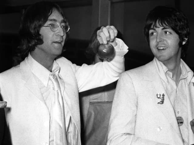 John Lennon and Paul McCartney after a trip to America to promote their new company Apple Corps,  May 1968. Picture: Stroud/Express/Getty Images