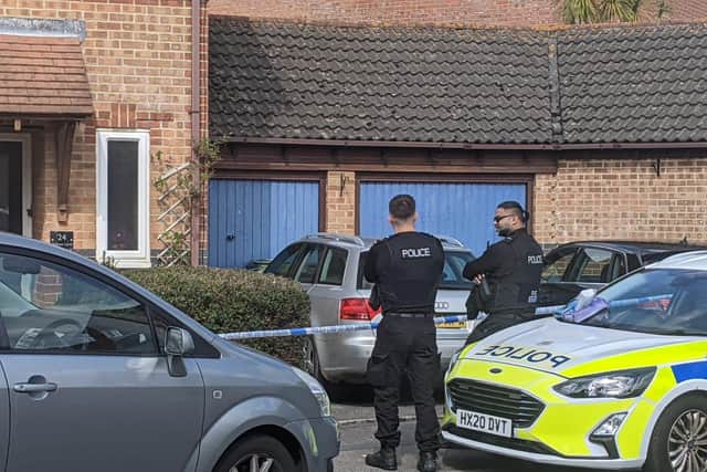 Police outside a house in Holcot Lane, Anchorage Park, Portsmouth today after two bodies were discovered. A murder probe has been launched after the death of a 60-year-old woman, and the body of a 66-year-old man was also found
Picture: Emily Jessica Turner
