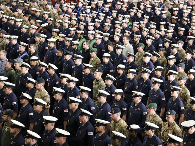Ships company gathered for the remembrance service held onboard HMS Queen Elizabeth in 2022. The service was led by Naval Chaplain Eddie Wills, wreaths were laid Commodore Angus Essenhigh, COMUKCSG, Captain Ian Feasey and Commander Air Group (CAG) Captain Mark Sparrow.