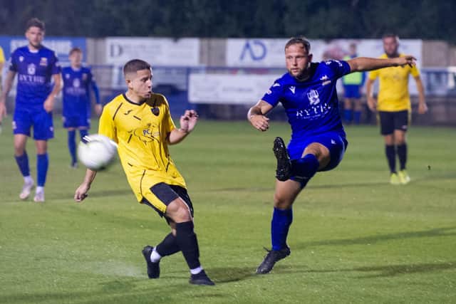 Josh Dean clears during Baffins' Wessex League Cup win against Infinity on Wednesday.
Picture: Habibur Rahman