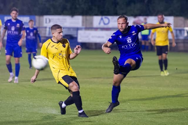 Josh Dean clears during Baffins' Wessex League Cup win against Infinity on Wednesday.
Picture: Habibur Rahman