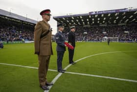 41 moving Portsmouth Remembrance Day images with fan and Charlton Athletic drama as faithful returned to Fratton.
