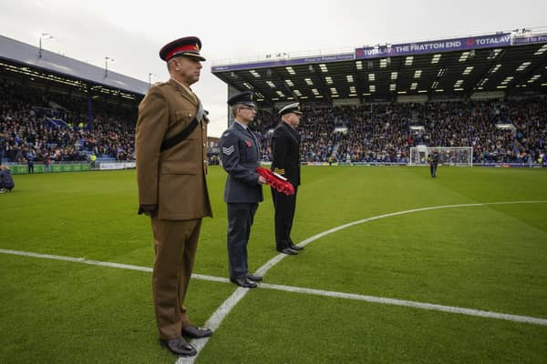 41 moving Portsmouth Remembrance Day images with fan and Charlton Athletic drama as faithful returned to Fratton.