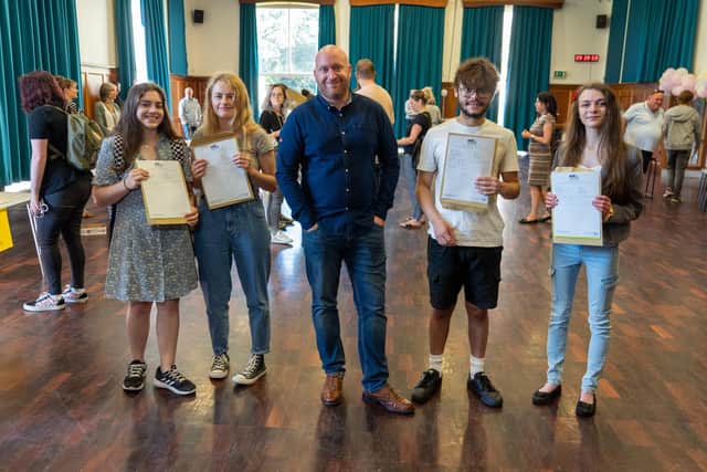 Nigel Matthias, executive headteacher with students Picture:  Mathew Clark