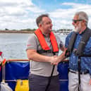 Liam Dobbin from Superyacht Charities, who donated £3,500 to help with mooring fees, with David Weinstock, Secretary of Sailing Therapy. Picture: Mike Cooter (200822)