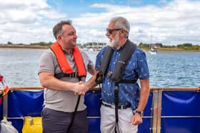 Liam Dobbin from Superyacht Charities, who donated £3,500 to help with mooring fees, with David Weinstock, Secretary of Sailing Therapy. Picture: Mike Cooter (200822)