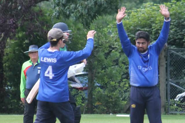 Rakshith Rao celebrates one of his five wickets at Sarisbury. Picture: Roy Honeybone