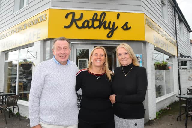 Kathy's Cafe in Gosport Road, Stubbington.

Pictured is: (middle) Kathy Wingate, owner of Kathy's Cafe with her mum and dad Pauline and David Knight.

Picture: Sarah Standing (091020-5238)