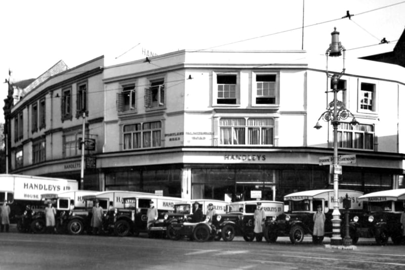 A line up of Handley's delivery vehicles at Handley's corner in 1930.