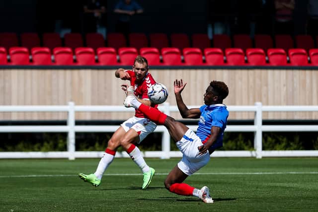 Brandon Mason puts in a block during his only Pompey pre-season appearance. Picture: Rogan/JMP