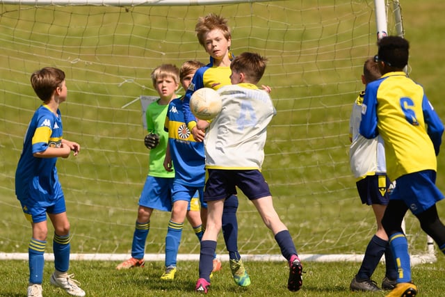 Action from the Clanfield youth football tournament at Horndean Technology College. Picture: Keith Woodland (270521-389)