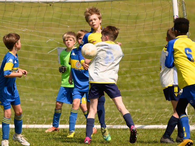 Action from the Clanfield youth football tournament at Horndean Technology College. Picture: Keith Woodland (270521-389)