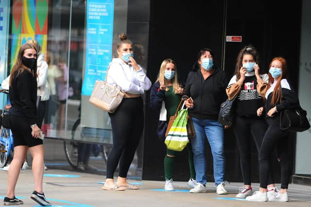 Shoppers in Commercial Road in Portsmouth. Picture: Sarah Standing (150620-4122)