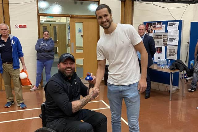 Knox White with former Pompey defender Christian Burgess, January 2020