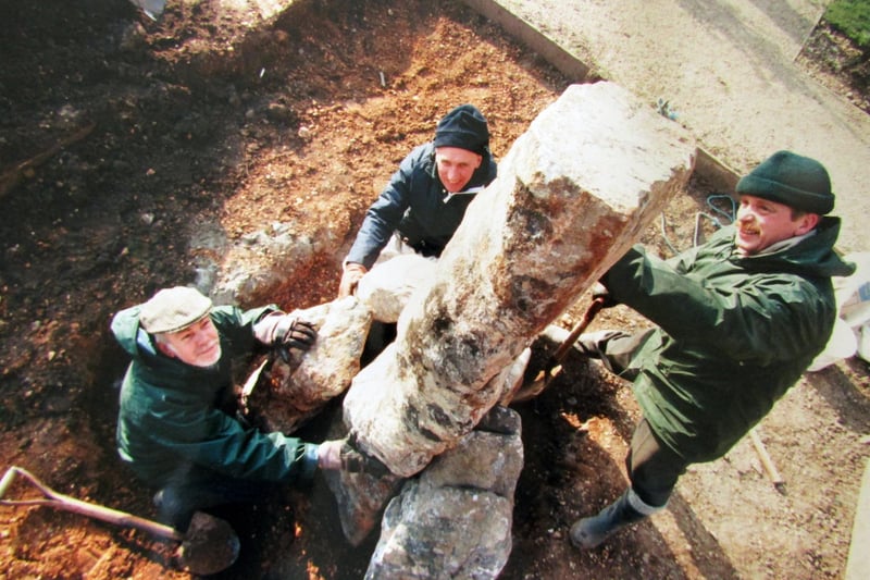 Maintenance staff (clockwise) Chris Roser, Bill Samways and Jim Tann, place the large stones from the Falkland Islands, to form part of the outdoor memorial to the Royal Marines. 26th January 1996