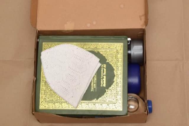An image of a shoebox of items shown to the court.