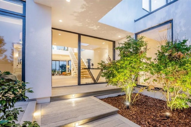 This home is very modern and has an open plan layout throughout in order to present stunning beach views.
