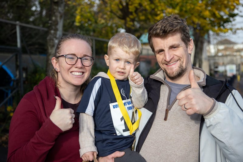 Thousands arrived in Gosport on Sunday morning for the Gosport Half Marathon, complete with childrens fun runs.Pictured - Kriss Suter, 4 with Mum and Dad after completing the fun run.Photos by Alex Shute