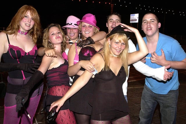Clubbers having a good time arriving outside Time & Envy nightclub at South Parade, Southsea in the 00s.