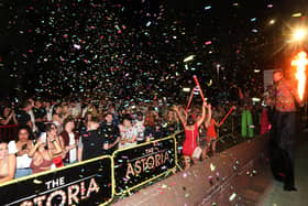 Revelers outside The Astoria nightclub in Portsmouth's city centre celebrate the lifting of Covid-19 restrictions at 12.01am on Monday, July 19.