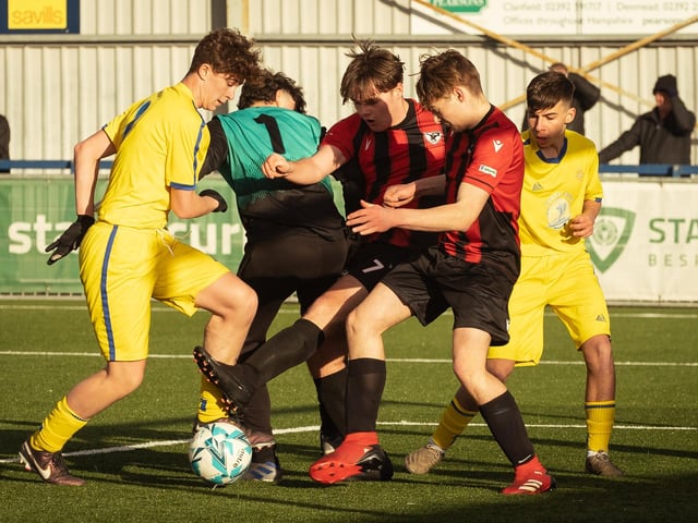 Action from the U16 GEC Marconi Invitation Cup final between Horndean Hawks Condors (red/black) and Pickwick Youth Panthers (yellow). Picture: Keith Woodland (260221-635)