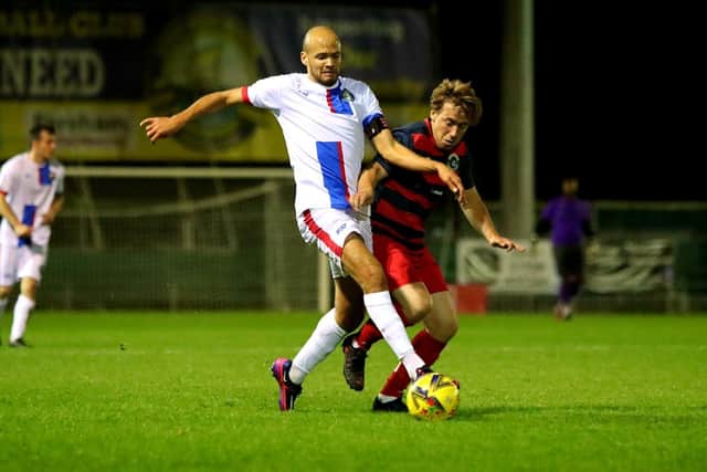 Josh Huggins, left, in action for Gosport against Paulsgrove. Pic: Tom Phillips