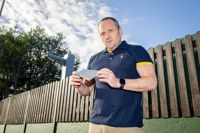 Alex Booth outside his home in Bedhampton road, Havant with the remnants of the camera on 26 October 2020.

Picture: Habibur Rahman