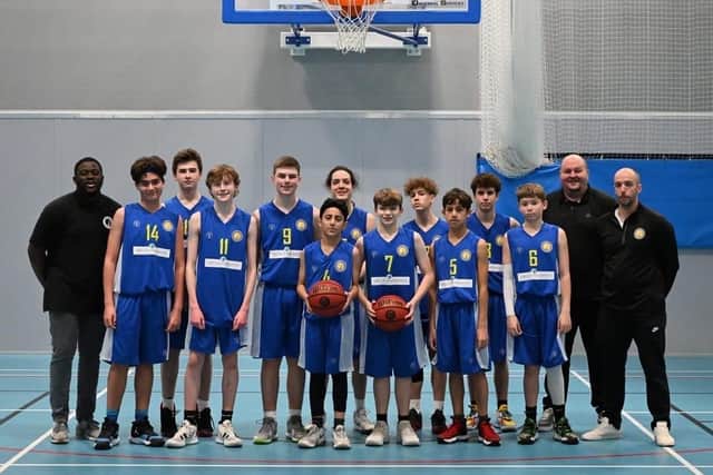 Portsmouth Basketball Club's under-14s team with coaches Daniel Fatomide, far left, John Southey, far right, and Tom Milner, second from right, were one of two age group teams entered into the regional national leagues last season