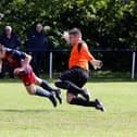 Zac Willett beats the Liphook keeper to head in the second of his three goals. Picture: Sam Stephenson