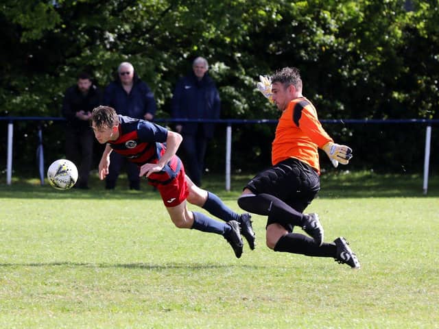 Zac Willett beats the Liphook keeper to head in the second of his three goals. Picture: Sam Stephenson