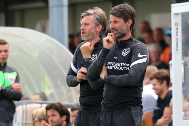 Nicky Cowley, left, alongside brother Danny on the touchline for Pompey's pre-season game against the Hawks.