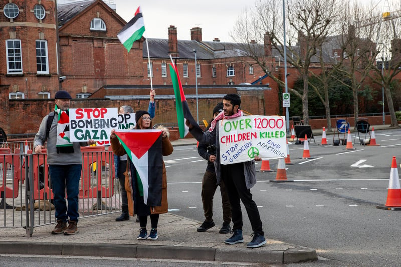 Demonstrators making their point known to passing motorists
Photos by Alex Shute