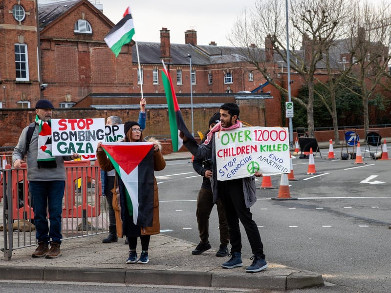 Demonstrators making their point known to passing motorists
Photos by Alex Shute