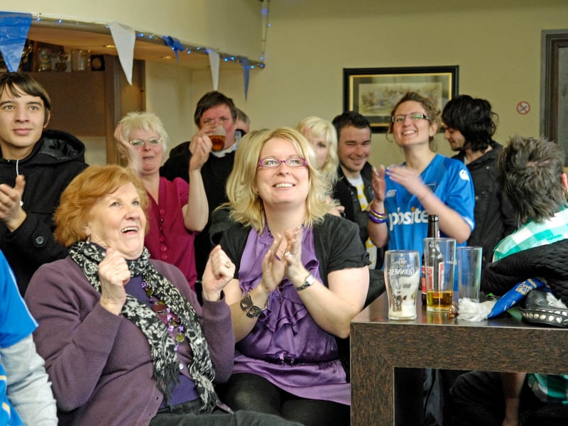 These Pompey fans celebrate the Blues' 4-1 win at Southampton in the FA Cup in 2010.