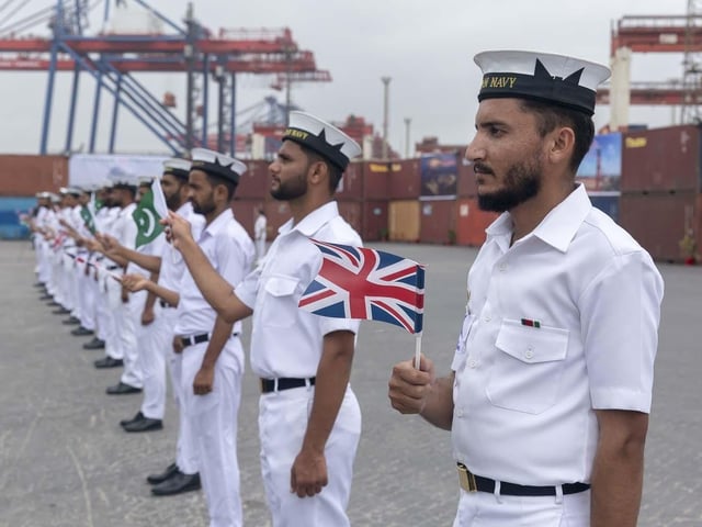 Pakistani sailors welcome HMS Lancaster to Karachi. Picture: Royal Navy.