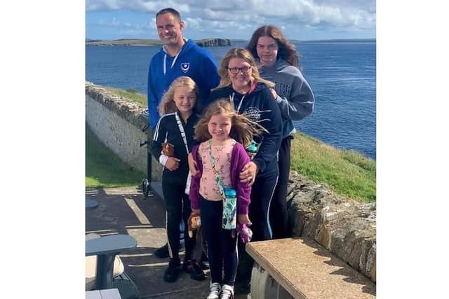 A fundraiser has been set up for Sophie Fairall, 9, who has been diagnosed with a rare soft tissue cancer. Pictured: Sophie with her dad Gareth, mum Charlotte and sisters Lucy, then 13, and Amelia, then 8