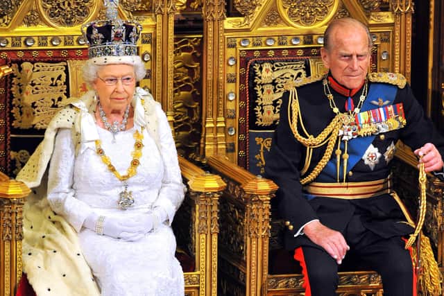 Queen Elizabeth II and Prince Philip, Duke of Edinburgh at the State Opening of Parliament in the House of Lords at the Palace of Westminster on June 4, 2014 in London, (Photo by Ray Collins - WPA Pool/Getty Images)