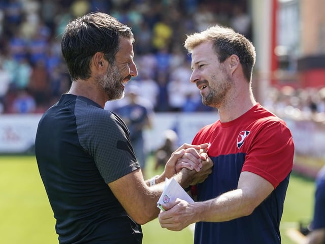 Danny Cowley shaking Wade Elliott's hand ahead of kick-off.