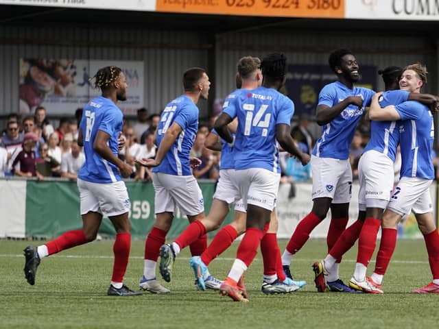 Liam Vincent, left, is mobbed by his Blues team-mates following his second-half free-kick. Picture: Jason Brown/ProSportsImages