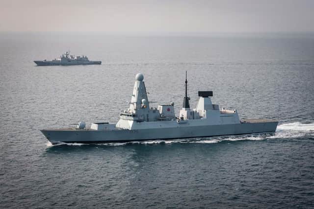 HMS Defender monitors Russian frigate Admiral Grigorovich. Picture: LPhot Matt Bradley/Royal Navy.