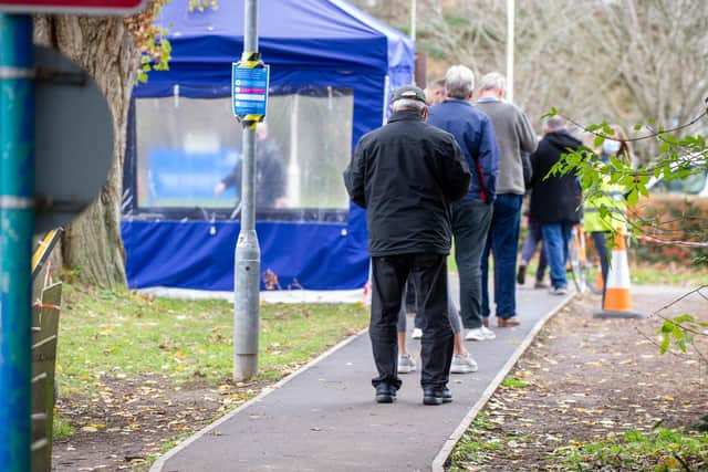 People queuing to get their booster jab at  the Covid-19 vaccination centre at St James' Hospital, Portsmouth
Picture: Habibur Rahman