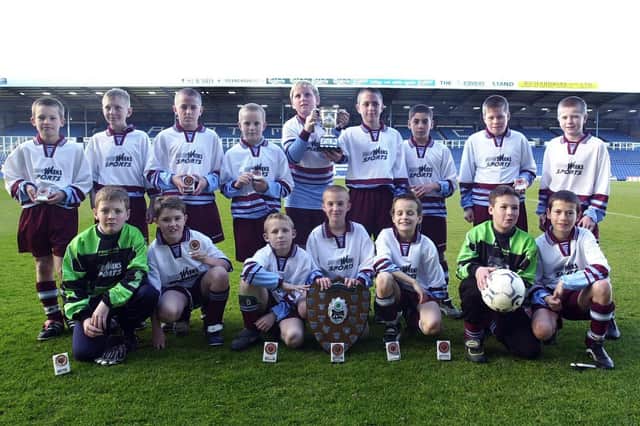 Flashback to Joe Foster and Rich Harris playing in the same Lyndhurst Juniors Under-11 side, in the Portsmouth Schools' FA cup final. Back - Joe Foster, Curtis Wall, Tyler Wake, Joe Puddick, Jay Cook, Joe Warner, Ayyub Benaher, Craig Cowlishaw, Jay Riipiner. Front - Daniel Jackson, Lewis Richards, Henry Stevens, Dean Arnold, Andrew Read, Carl Rogers, Richard Harris. Picture: Esme Allen