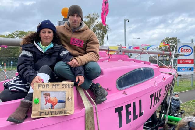British Olympians Laura Baldwin and Etienne Stott outside ExxonMobil's Fawley Oil terminal Picture: Ben Mitchell/PA Wire
