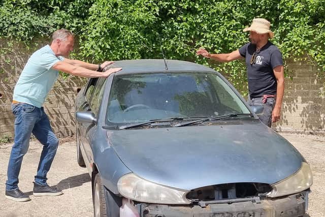 Pictured: Tim and Fuzz with the Ford Mondeo before
Photo credit: Renegade Pictures/National Geographic