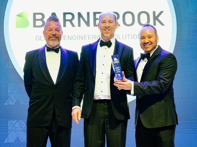 Mark Collins presents Barnbrook Systems Ltd with Manufacturing & Engineering Company of the Year. Picture: Keith Woodland (270321-57)
