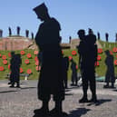 The outdoor installation features life-size silhouettes of the 258 military personnel and civilians who lost their lives in the Falklands Conflict. Photo credit should read: Andrew Matthews/PA Wire